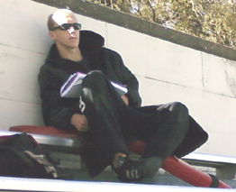 UC Davis lifeguard sitting on rescue tube: 