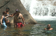 a helping hand getting across slippery rocks: 