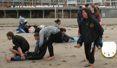 front and back carry at beach 2010: beach in front of hotel with various lifeguard students practing a carry