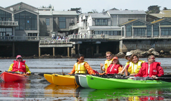 may 2005 De Anza College ocean kayakers with mb aquarium behind them: 