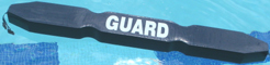 gray rescue tube diagonal on pool surface: gray rescue tube diagonal on pool surface