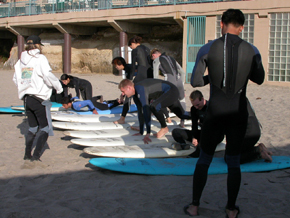 practice standing on surfboards: 