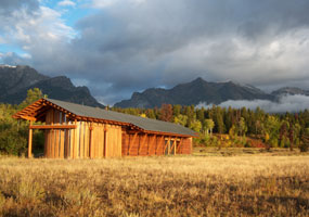 LSR preserve center NPS photo: building in sage flat with mountains behind