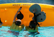 Mimi and Karen right the kayak: 