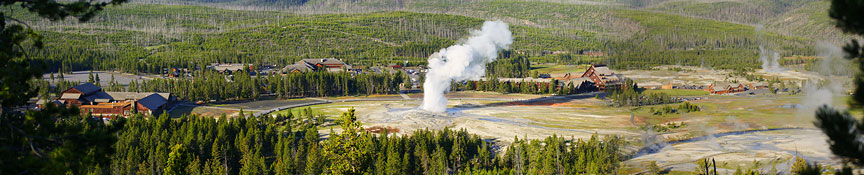 old faithful geyser by Ron Niebrugge: old faithful geyser and surrounding forest and lodges, photo used with permission from the photographer Ron Niebrugge