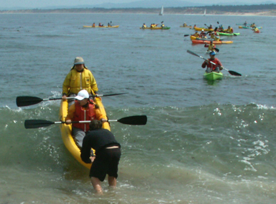Outdoor club ocean kayak landing on shore 2007: 