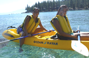 Phung and Dziem kayak lake tahoe unknown photographer: Two women in a kayak on Lake Tahoe