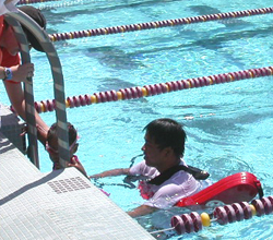 Quang Tran and his first assist silicon valley kids triathlon 2005: 