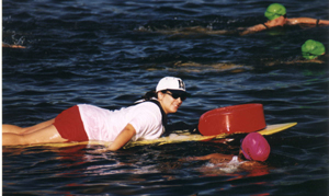 paddling with a swimmer: 