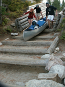 canoe down portage stairs: 