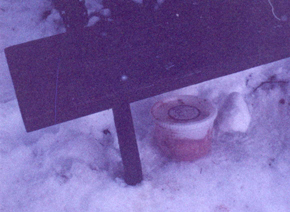 food container under table bench: 