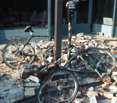 fallen unreinforced brick facade vs bicycles Loma Priena quake USGS photo: 