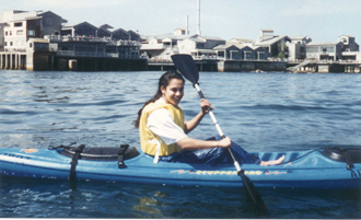 kayak with Monterey Bay Aquarium in background: 