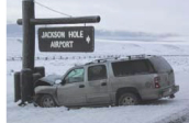 nps photo SUV hit sign: nps photo snowy road, SUV with a crumpled hood hit sign