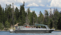 shuttle boat on Jenny lake: shuttle boat underway on Jenny lake