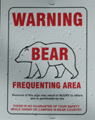 sign warning bear frequenting area: 