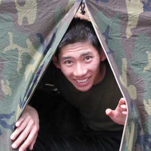 snow camp 2015 louis: man coming out of a tent