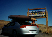 rental car with kayaks loaded on top: 