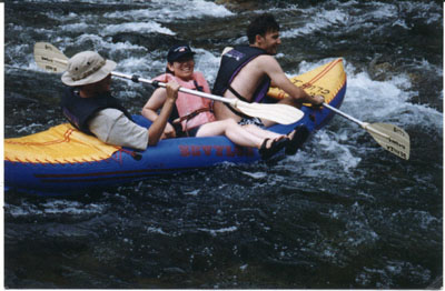 whee: raft going through the little bit of whitewater