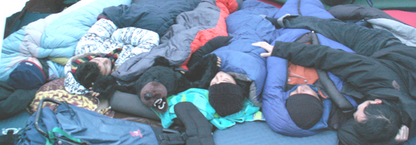 2009 group alseep in tent 600 pixels: group asleep in tent with large stuffed bear