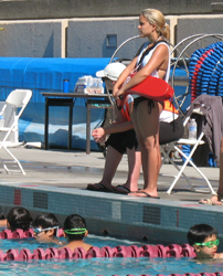 Emily May guarding Kid's triathlon: Emily May guarding Kid's triathlon photo by Alan Ahlstrand, Red Cross Lifeguard Instructor and Volunteer of Record for De Anza College