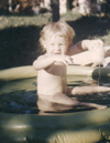 Mary in a wading pool: Mary in a wading pool wearing only a smile.