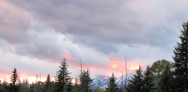 Schwabacher landing sunset 2010 photo by Alan Ahlstrand: mostly clouds, some mountains and trees