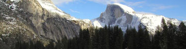NPS photo half dome and cliffs in snow: half dome and cliffs in snow