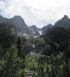 cascade canyon cascades and clouds: cascades down a forested cliff and clouds