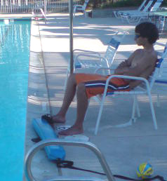 lifeguard not rescue ready July 2009 Cupertino private pool: a lifeguard not rescue ready, his rescue tube at his feet