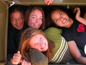 four girls in bear box: 