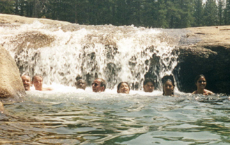 Tuol group waterfall: intrepid Tuolumne campers swimming at possibly the best swimming hole (maybe too much current in June, but a small waterfall even in August)