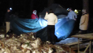 setting up rain fly 2011 winter trip: setting up rain fly for a tent after dark