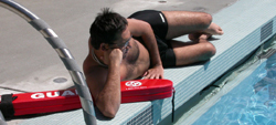 lifeguard lying on his side: 