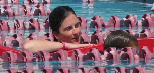 jessica perine 2013 kids tri: lifeguard assists a swimmer