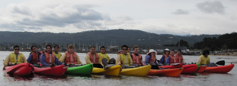 kayaking March 2014 group photo out on the water: kayakers somewhat in a row out on Monterey Bay