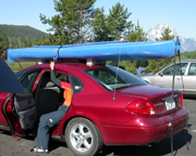 loading a kayak on a car Mary Donahue