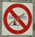 no diving warning symbol in pool tiles: 