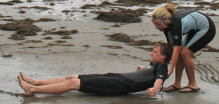 onerescuerbeachdrag2010 148 pixels: lifeguard practices a beach drag