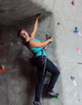 photo by Alex Mitchell, Alanna Klassen climbing: girl on climbing wall