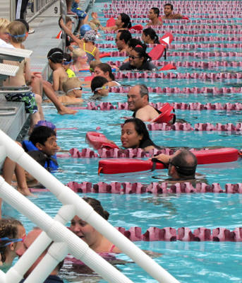 youngest triathletes with lifeguards in the water: youngest triathletes with lifeguards in the water