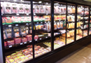 refrigerated grocery case of packaged food