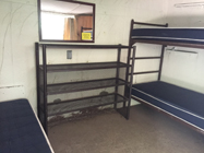 one double bed, shelves and twin bunk beds