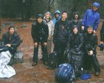 hikers in waterproof rain jackets and pants