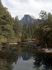 NPS photo of Half Dome with a reflection in river, 