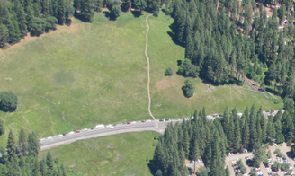 roadway, large meadow and boardwalk