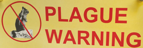 sign that says plague warning