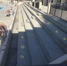 bleachers with yellow circles showing potential seating