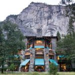 end of hotel with cliffs behind