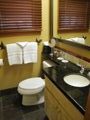 bathroom with long sink counter